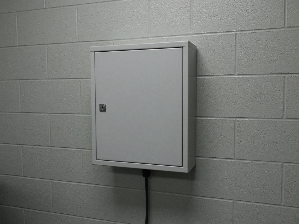 Small wall cabinet with a key lock